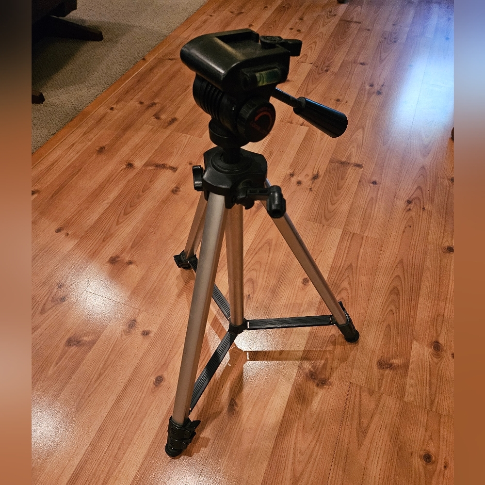 Versatile Black and Silver Tripod for Cameras